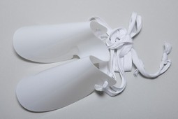 Strømpepåtager/-påtrækker Strømpepåtager/-påtrækker