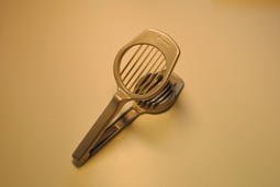 Champignon skærer  - eksempel fra produktgruppen andre hjælpemidler til at skære, hakke og dele med i forbindelse med madlavning