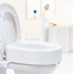 Etac Hi-Loo løstmonteret toiletforhøjer med kantstop og låg