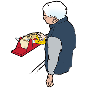 Mand skærer med én hånd brød i en skærekasse
