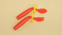 Childrens cutlery, angled for right hand, with shield