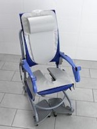 Arjo, Carino, height adjustable shower and commode chair