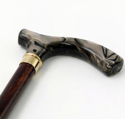Wooden stick with an elegant handle