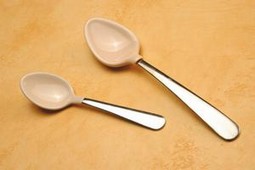 Spoon with plastic coating