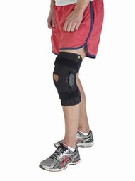 Knee bandage wih side rails and velcro