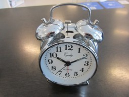 Alarm clock with luminous hands