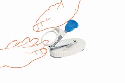 Nail clipper with magnifier