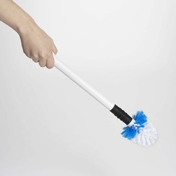 Toilet brush with flexible head and holder