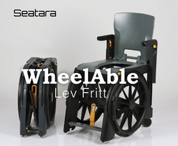 Wheelable foldable toilet/bathchair with wheels and foldable armrests