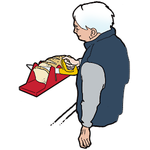 Man is slicing bread using a cutting frame